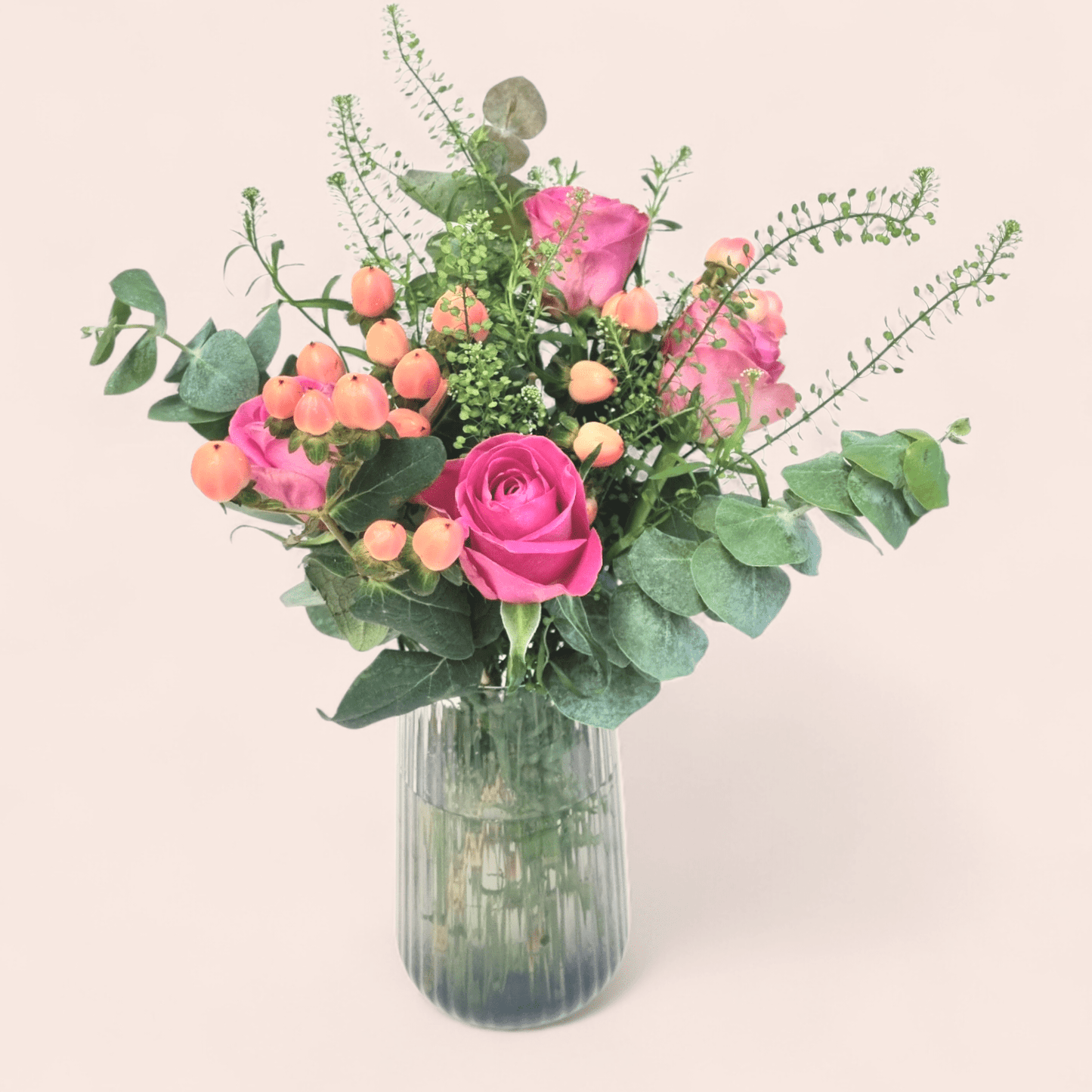 Seasonal bouquet + bubbles + confectionery (large cities)