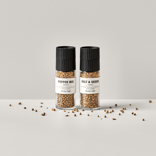 Gyllen salt- og pepperblanding i keramisk kvern