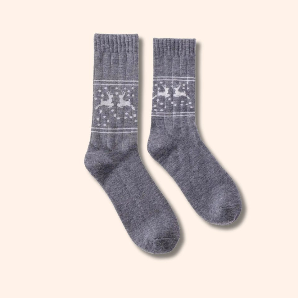 Wool socks with reindeer motifs