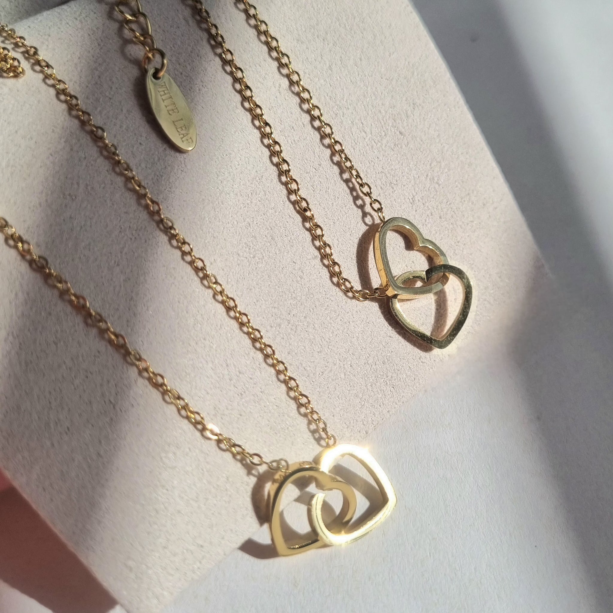 Jewelry sets with linked hearts